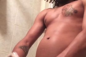 Dread-Head with a Latex Glove Jerks off in Shower
