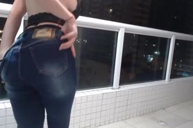 hot girl taking off her perfect body jeans