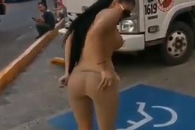 Giselle Montes Strips on public street