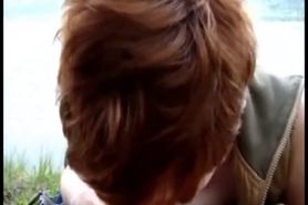 Redhead RyAnne outdoor blowjob (two thumbs up!!)
