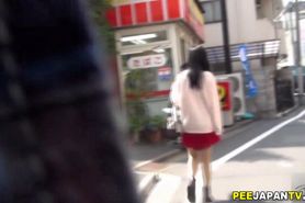 Asian peeing in public