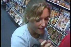 Horny blonde chick sucks a huge cock in the porn store, gets cum in her mou