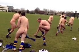 Naked rugby team in hazing
