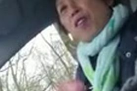 Older Chinese Lady Wanks Dick In Car