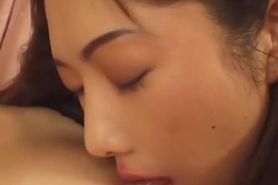 Oriental woman taught how to suck strap on by hot Asian Mistress