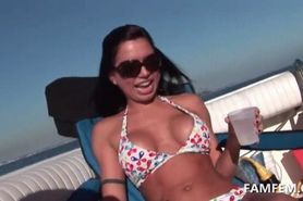 Chesty girl flashing pink snatch on a boat