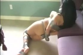 Taped up girl struggles rough to escape