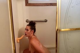 Horny milf Roxy Knight fucks suction cup dildo in shower doggystyle