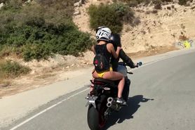 crazy chick masturbating on back on motorcycle