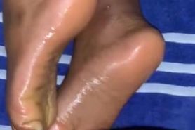 My mom’s friend let me cum on her soles