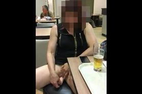 dildo in a crowed restaurant