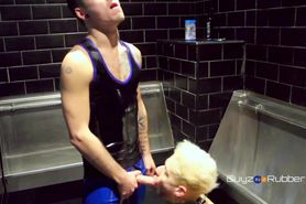 More from Two Guys in Rubber having fun in the Restroom after Pissing