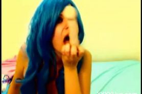 Blue haired teen masturbating her pussy