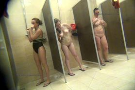 Women wash in a public shower  2_0202