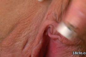Innocent teenie is spreading pink pussy in close up and getting off
