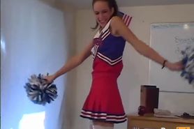 Brunette Cheerleader Showing Off Her Assets