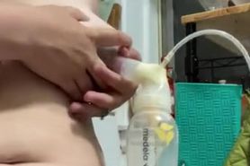 Milkymama plays with trimmed pussy before pumping milk engorged huge boobs