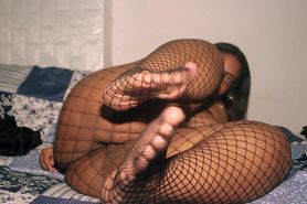 Sexy ebony bbw showing her feet and pussy in a mesh long socks