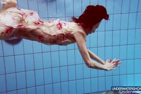 Underwater swimming in a dress by Martina