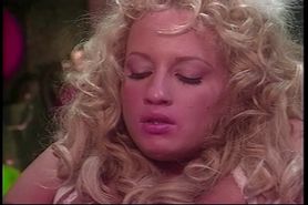 Curly haired blonde in white lace gets fucked behind the scenes