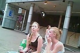 2 blonde girls laughing at cock