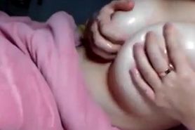 Asian girl shows  massages her great boobs
