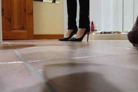 My wife getting ready to go out, she was reluctant to wear the shoes I had cum in earlier that day.