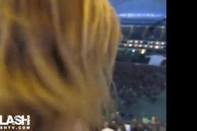 Girl strips at a stadium