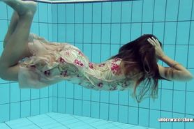 Lucy Gurchenko strips underwater and shows hairy vagina