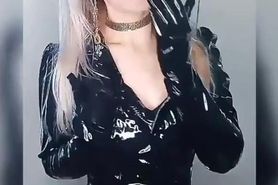 Blonde smoking in Shiny fetish outfit