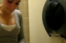 Girl Masturbates in rest room