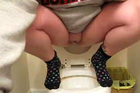 Piss peeing in toilet