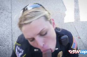 This horny and naughty female cop enjoys sucking black cocks in public