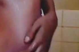 Hairy pussy 18-year-old ebony with salty clit takes a shower