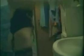 Chick masturbates on hidden cam in the bathroom