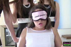 Blindfolded teen eats