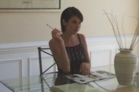 Woman Smokes in Dining Room