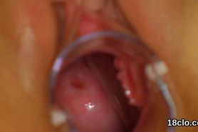 Sweet teenie is spreading narrow vulva in closeup and cumming