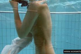 Vera Brass wet and horny in the swimming pool