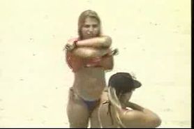 Blonde cutie undressing - beach voyeur video