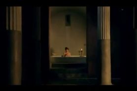 Lucy Lawless topless in the bath