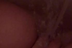 Latina teen with fat shaved pussy masturbates and orgasm with water jet