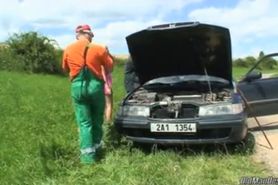 Young blonde does older guy's dick outdoors for a car fix