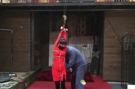 Chinese slave girl in suspension bondage
