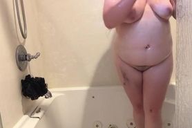 Cum and watch a cute chubby girl shower and play with herself