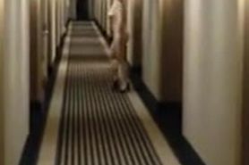 Blond lady walking nude in the hotel