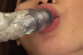 Solo Japanese girl wanks with a big dildo