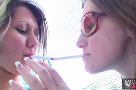 Two girls at some smoking and lesbian action