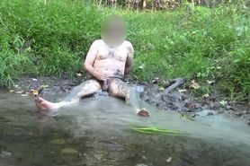 The Mud Bath -Sexy Nature Guy plays in the mud