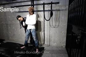 Stoic Man in PVC Straitjacket Gets Vibed Sample